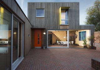Passivhaus Hampshirewith quarry tiles inside and out